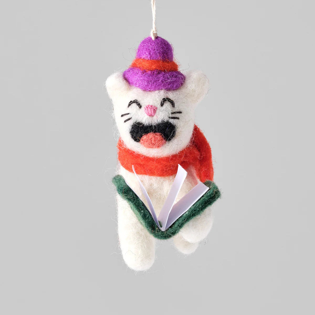 Adorno gato cantando villancicos