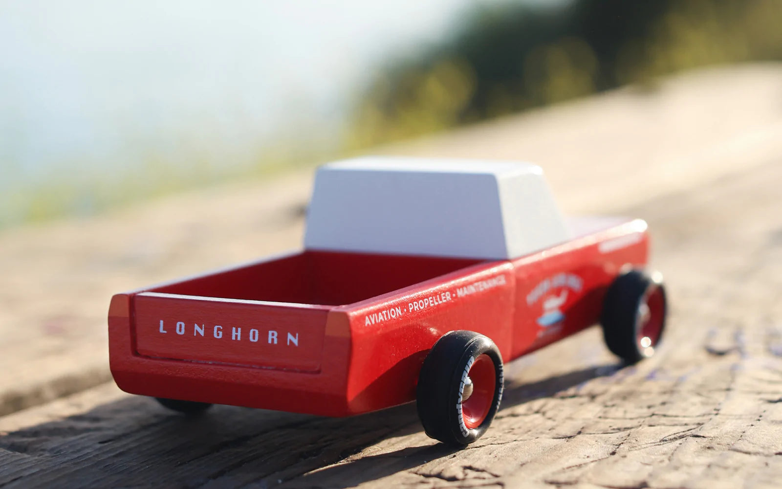 Red Longhorn Car