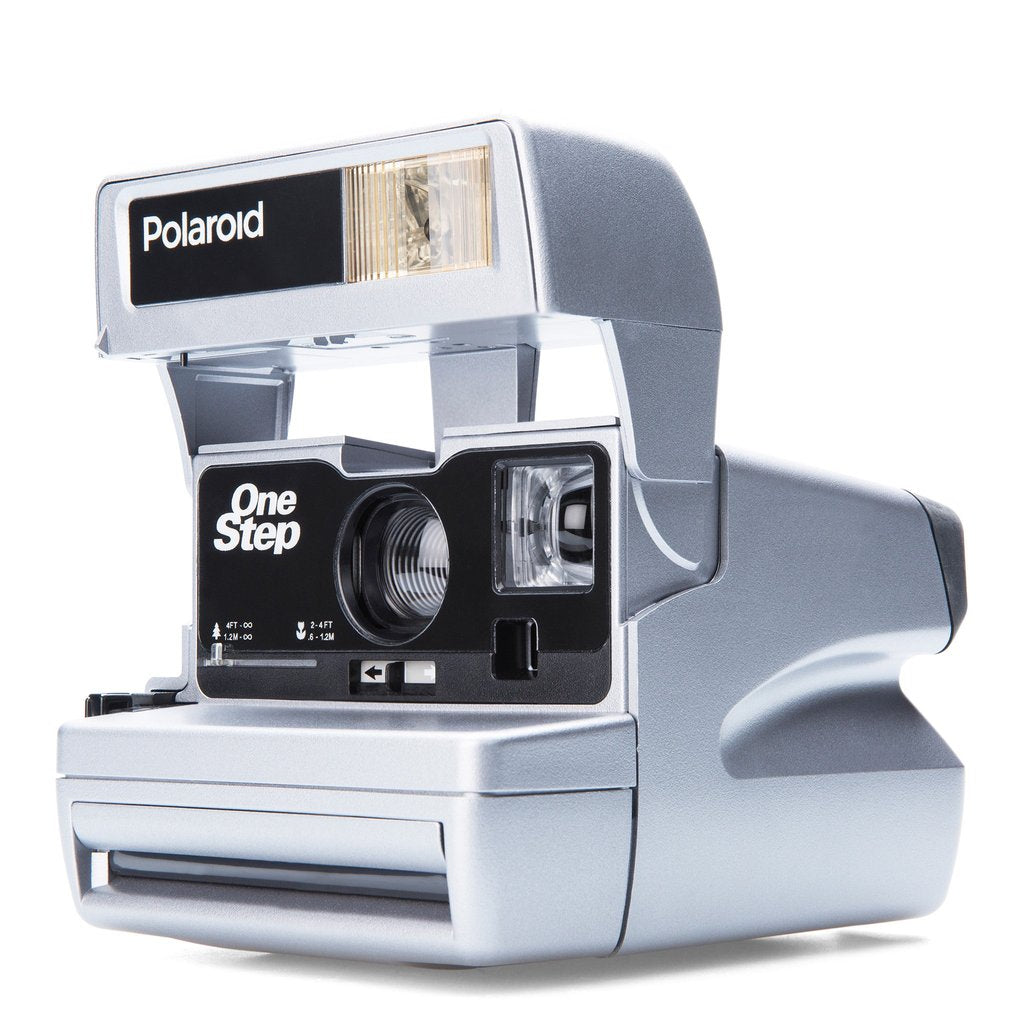 Polaroid One Step ton argent remis à neuf